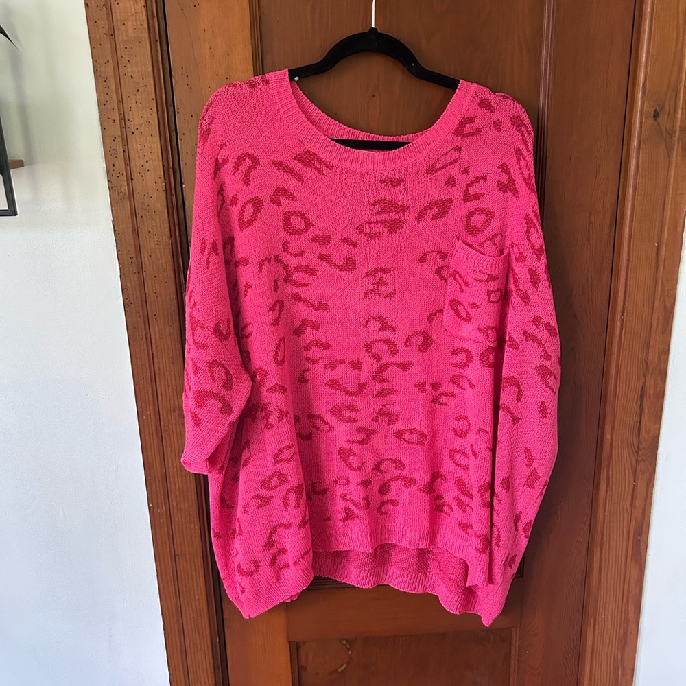 JODIFL Pink Crew Neck Sweater with Textured Animal Print